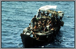 A typical small boat, overcrowded with Vietnamese heading ascross the South China Sea