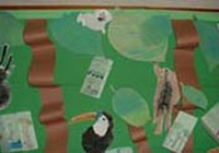 Painting of leaves, animals and trees.