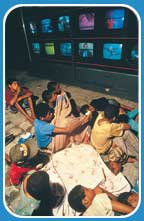 Street children watching TV
